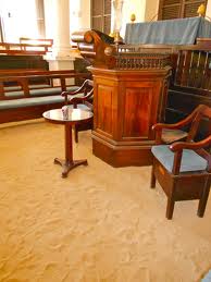 sand covered floor